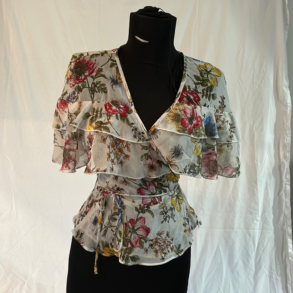 Beautiful feminine white and floral cross top